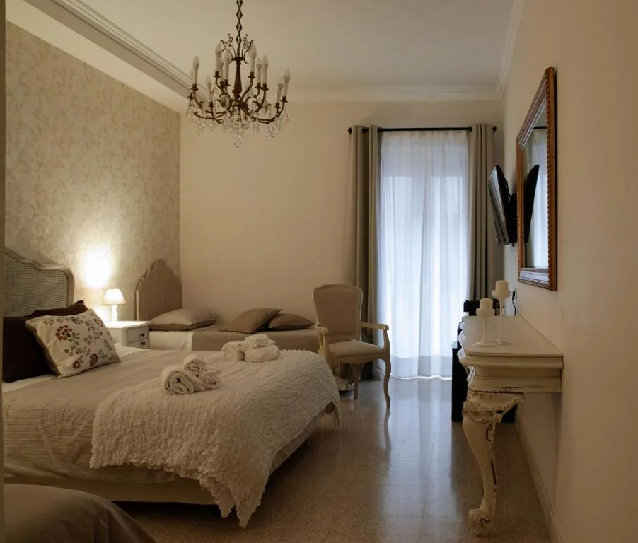 Camera Quadrupla Superior — PALAZZO ALESSANDRINI GUEST HOUSE