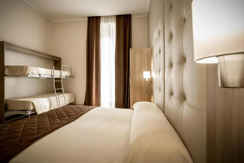 Superior Quadruple Room — Riva Superior