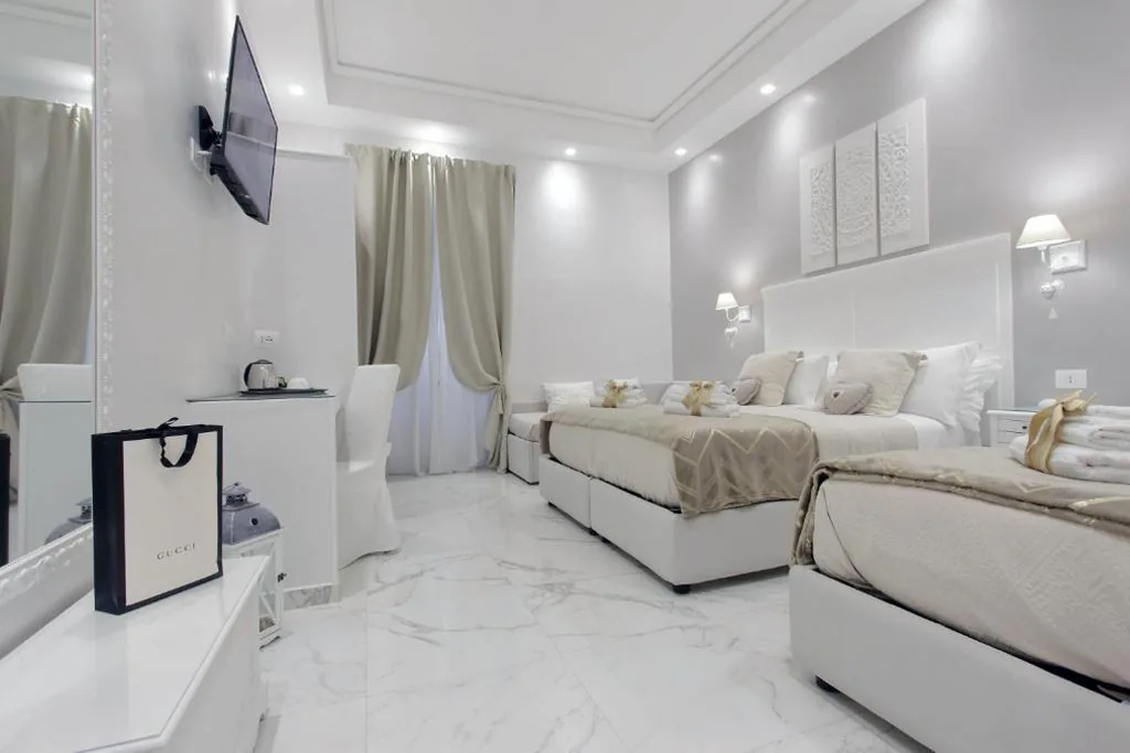 Superior Quadruple Room — Roman Holiday Colosseo