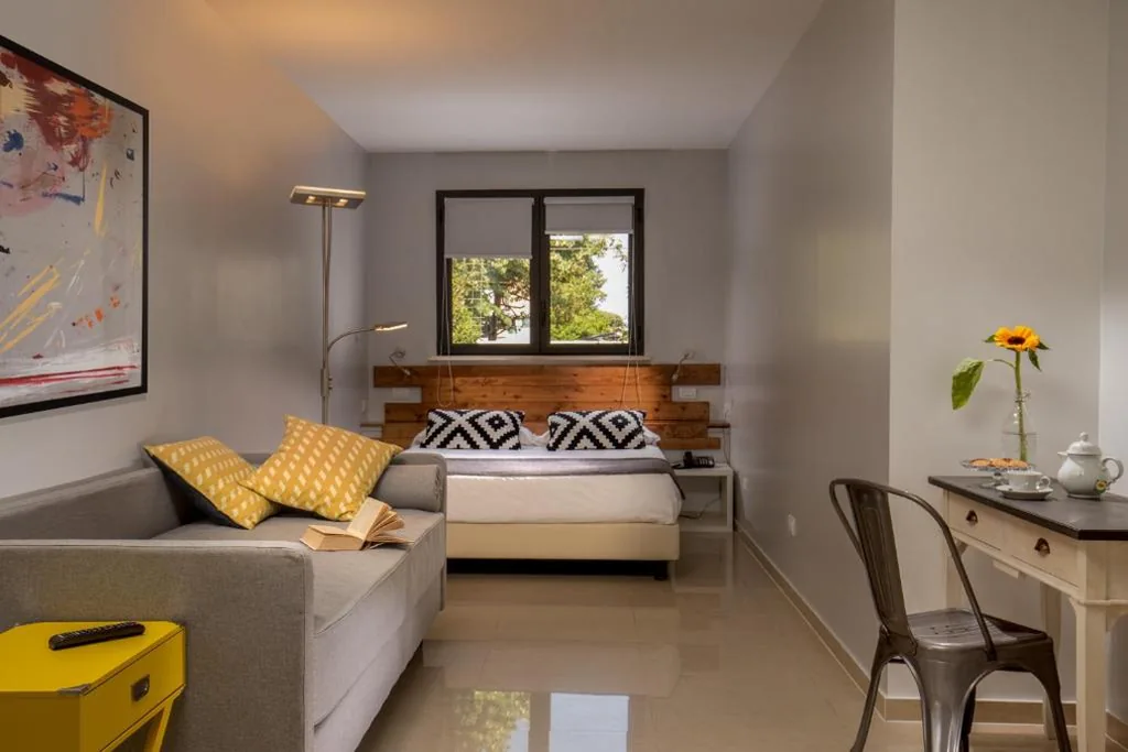 Quadruple Room — Urban Garden Hotel