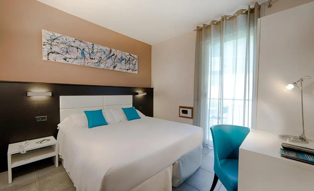 Queen Room with Balcony and Garden View — Best Western Regina Elena