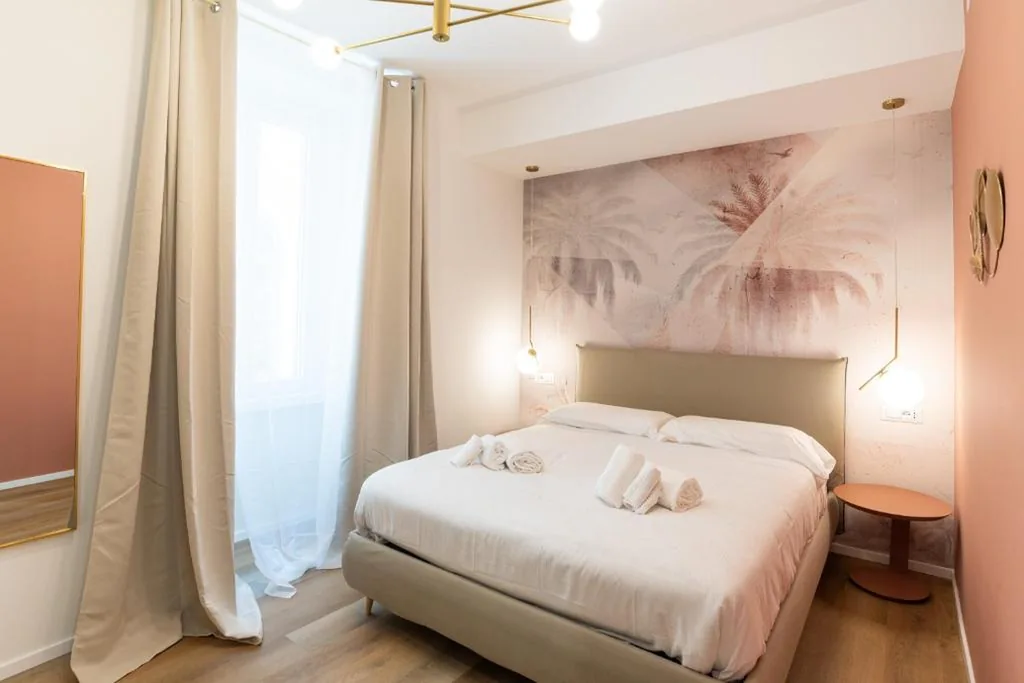 Queen Deluxe Room — Maison Rasella Suites