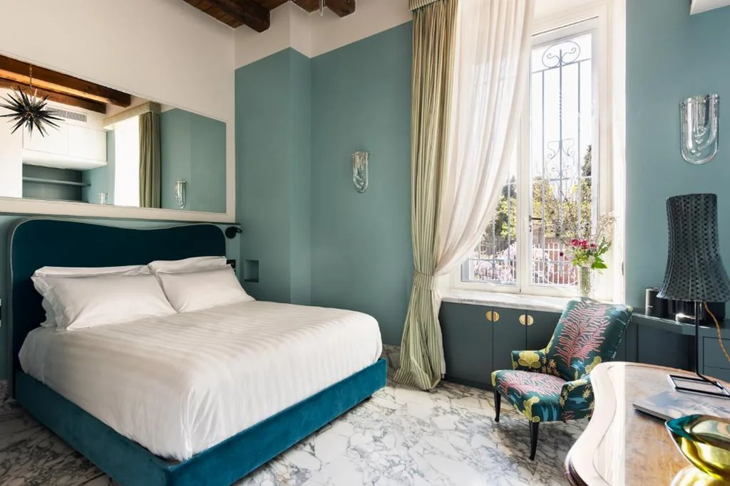 Queen Deluxe Room — Nus Hotel Poerio