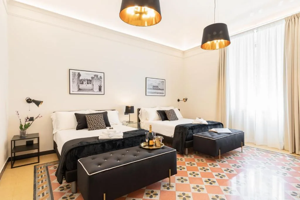 Camera Queen Executive con 2 Letti Queen-Size — Foresteria di Piazza Cavour – Luxury Suites & Guest House
