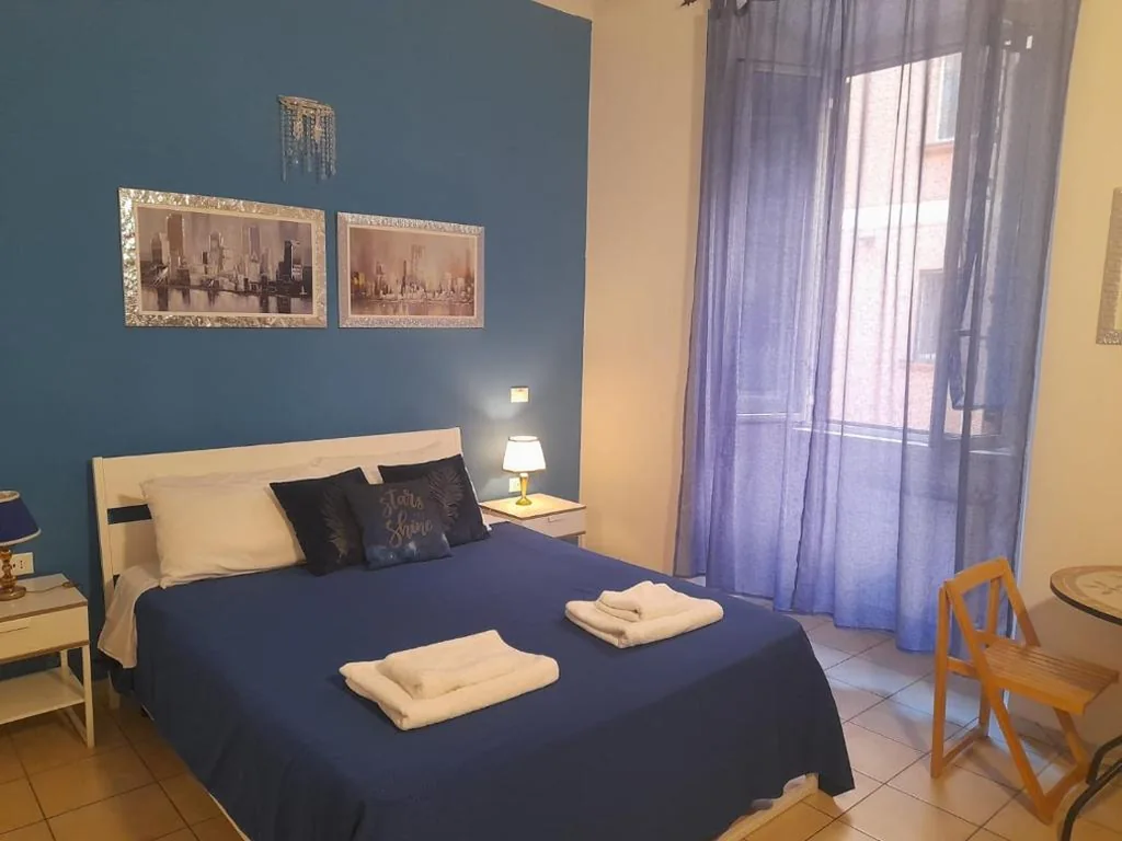 Camera Queen Standard — Casa Roma Affittacamere