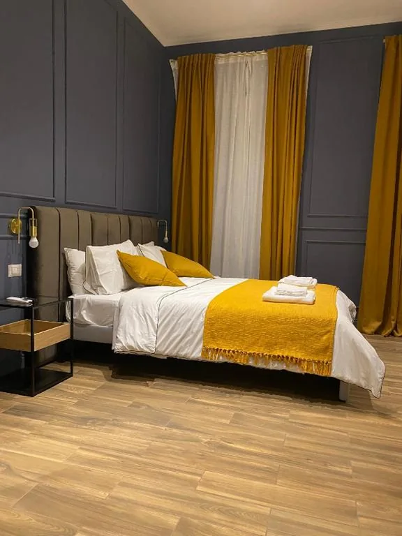 Queen Superior Room — Allegra Suites