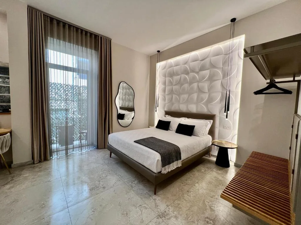 Camera Queen Superior — Elegant Rooms
