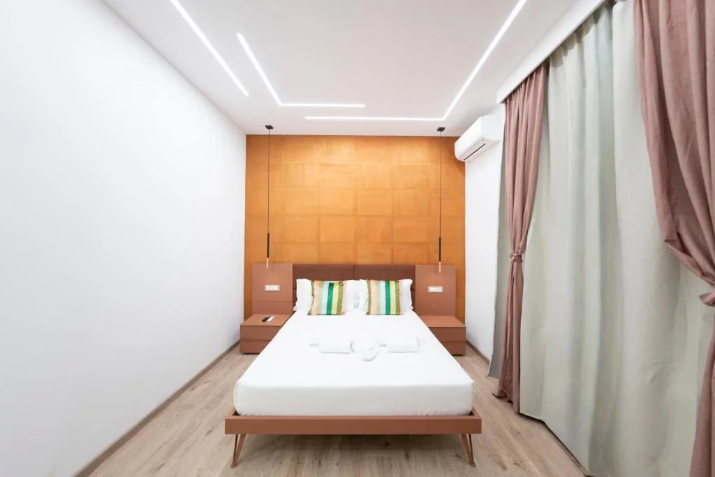 Camera Queen Superior — Giulio Cesare Luxury Rooms