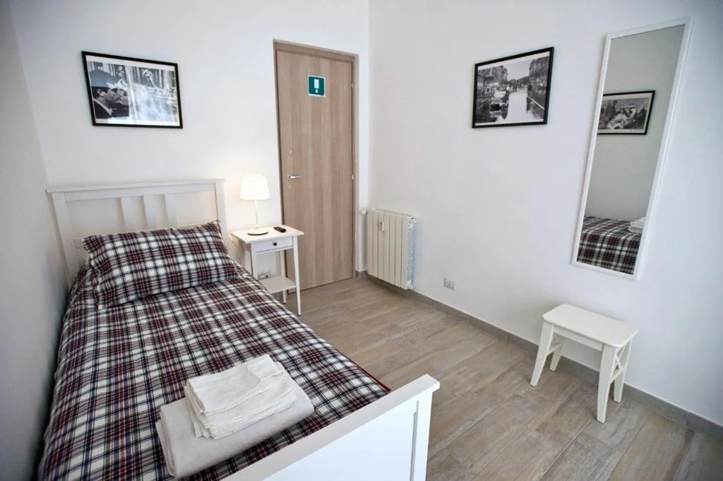 Single Room with Shared Bathroom — Fellini