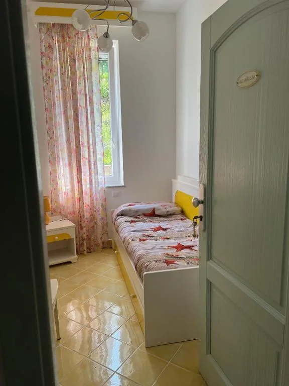 Camera Singola con Bagno Privato — Casa Baia Luna
