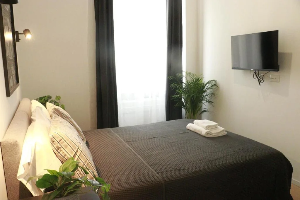 Camera Singola con Bagno Privato — Giulio Cesare Comfort Rooms