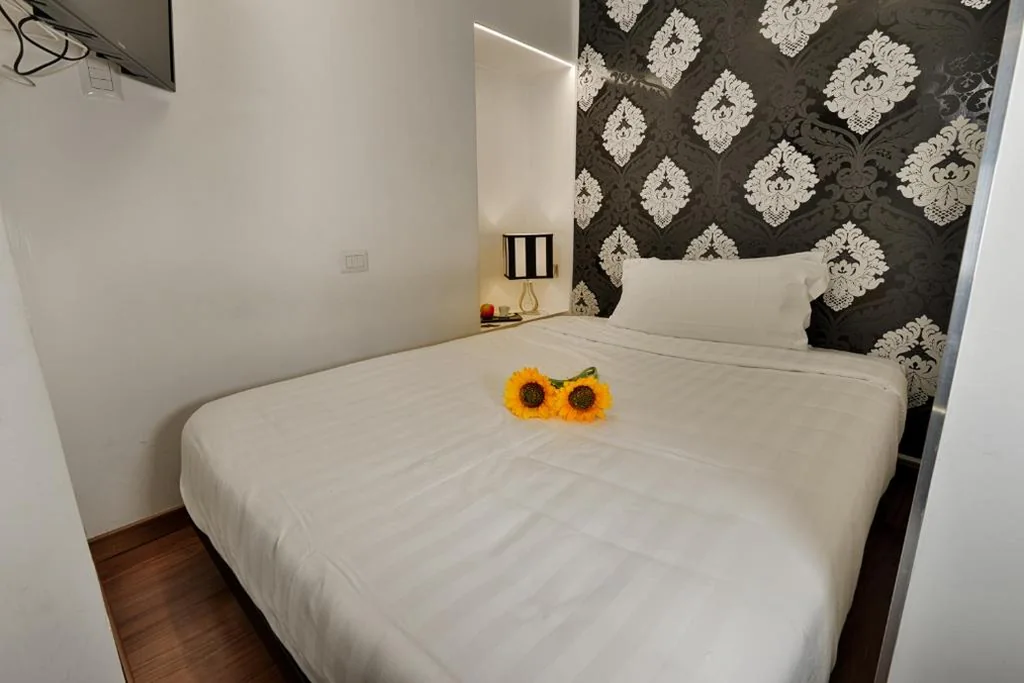 Camera Singola Deluxe — NAVONA VITA SUITES