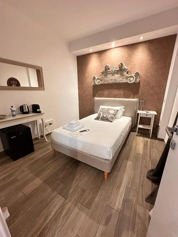 Camera Singola Deluxe — Popolo Rooms&Suites