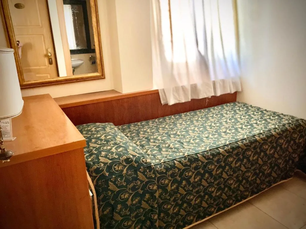 Economy Single Room — Hotel Champagne Palace
