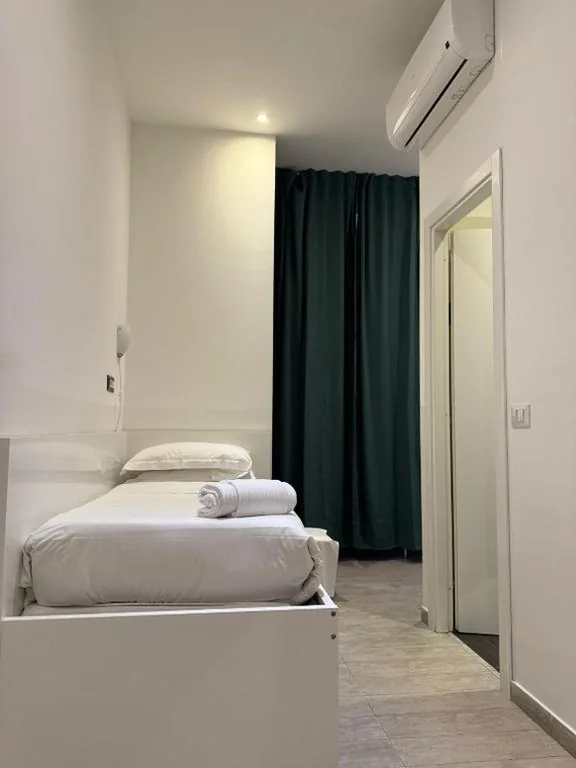 Camera Singola Economy — Relais Merulana Guest House