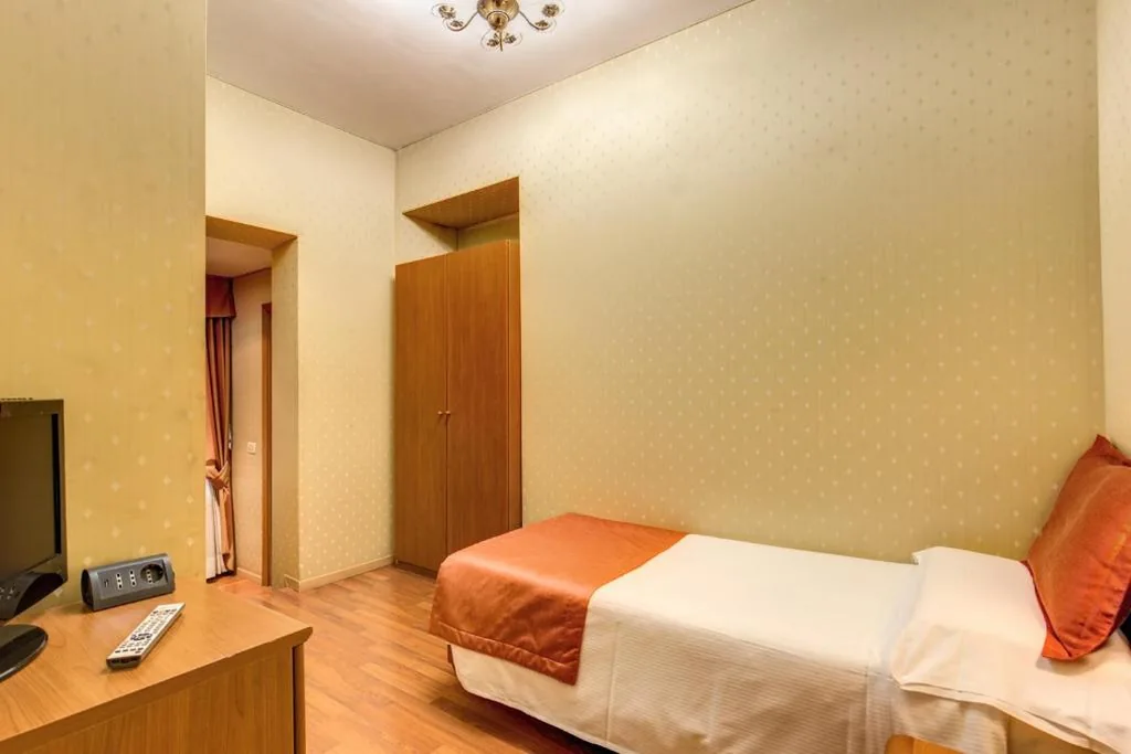 Single Room — Flower Garden Hotel