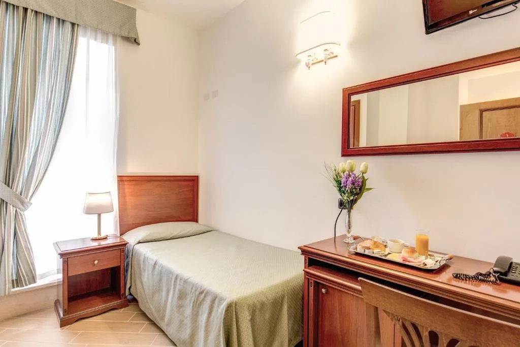 Single Room — Hotel Flavio