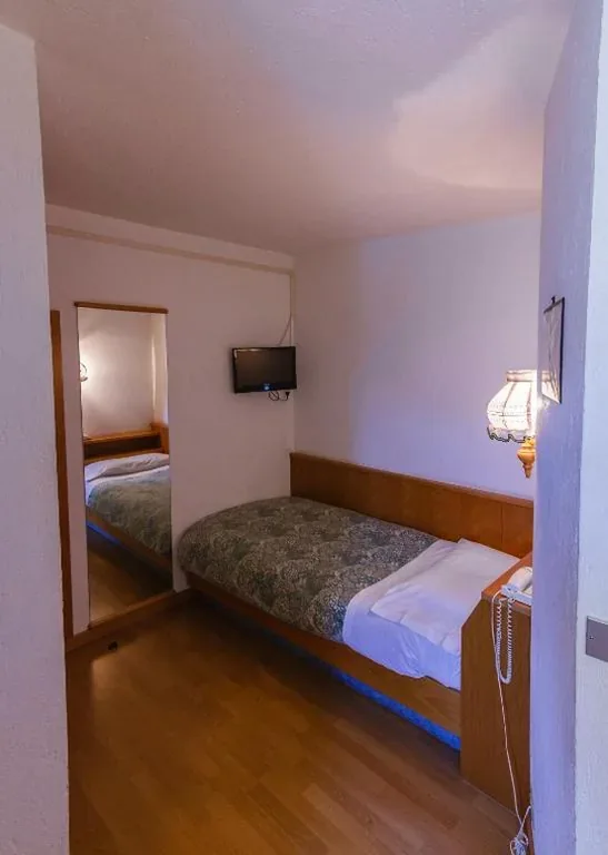 Camera Singola — Hotel Ottoz Meublé