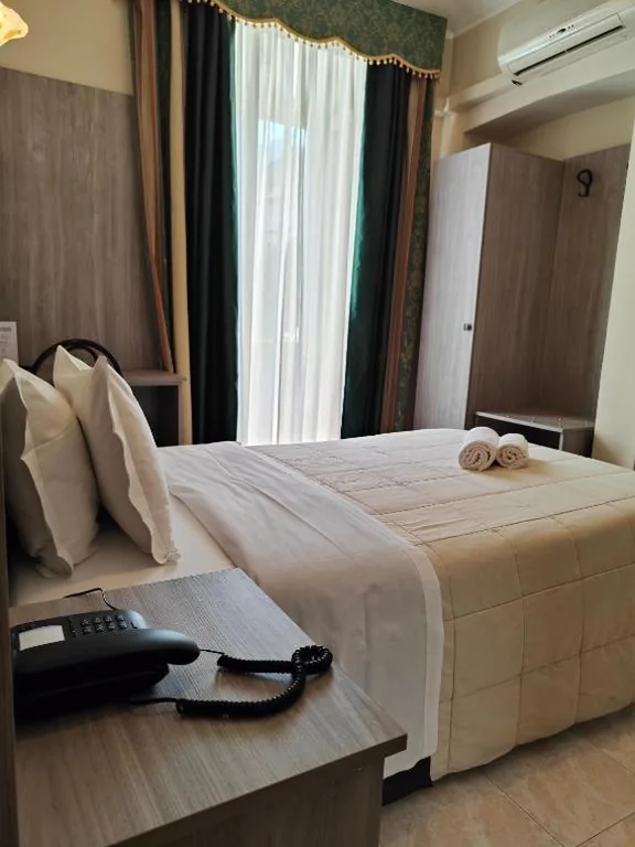 Single Room — Hotel Romano