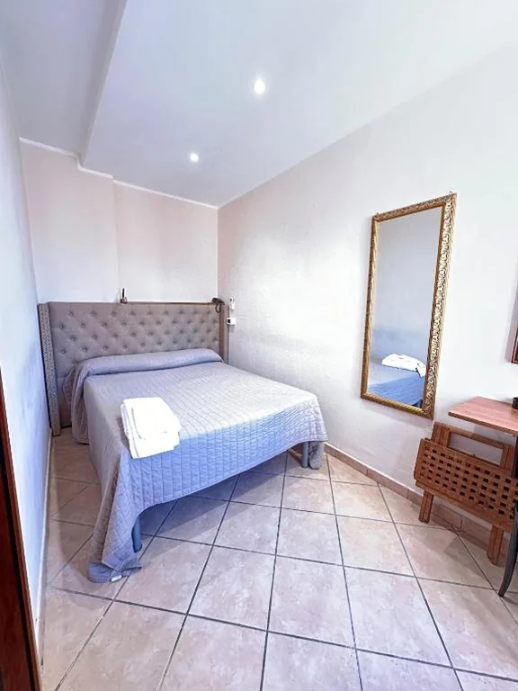Single Room — Hotel Svizzera