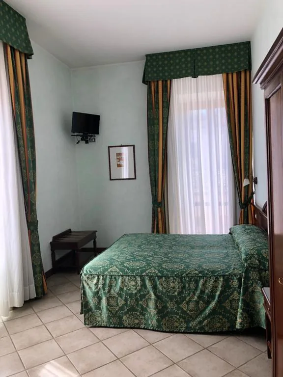 Single Room — Hotel Zodiaco