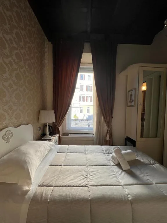 Camera Singola — Piazzetta de’ Monti Suites
