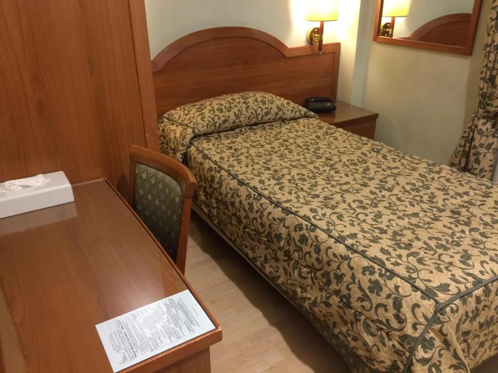 Standard Single Room — Coccodrillo Hotel & Apartments