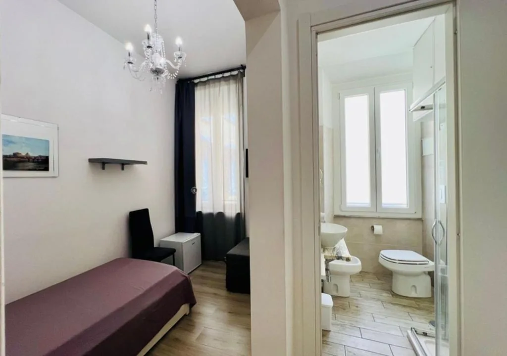 Standard Single Room — Inside Roma Rooms by DOT Suites