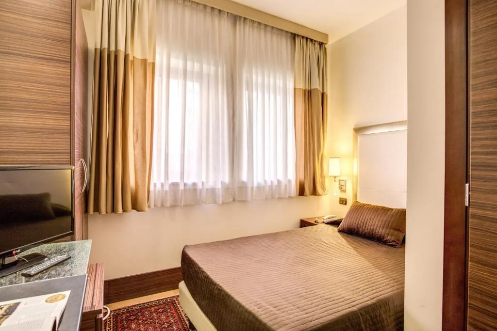 Single Room — The Strand Hotel