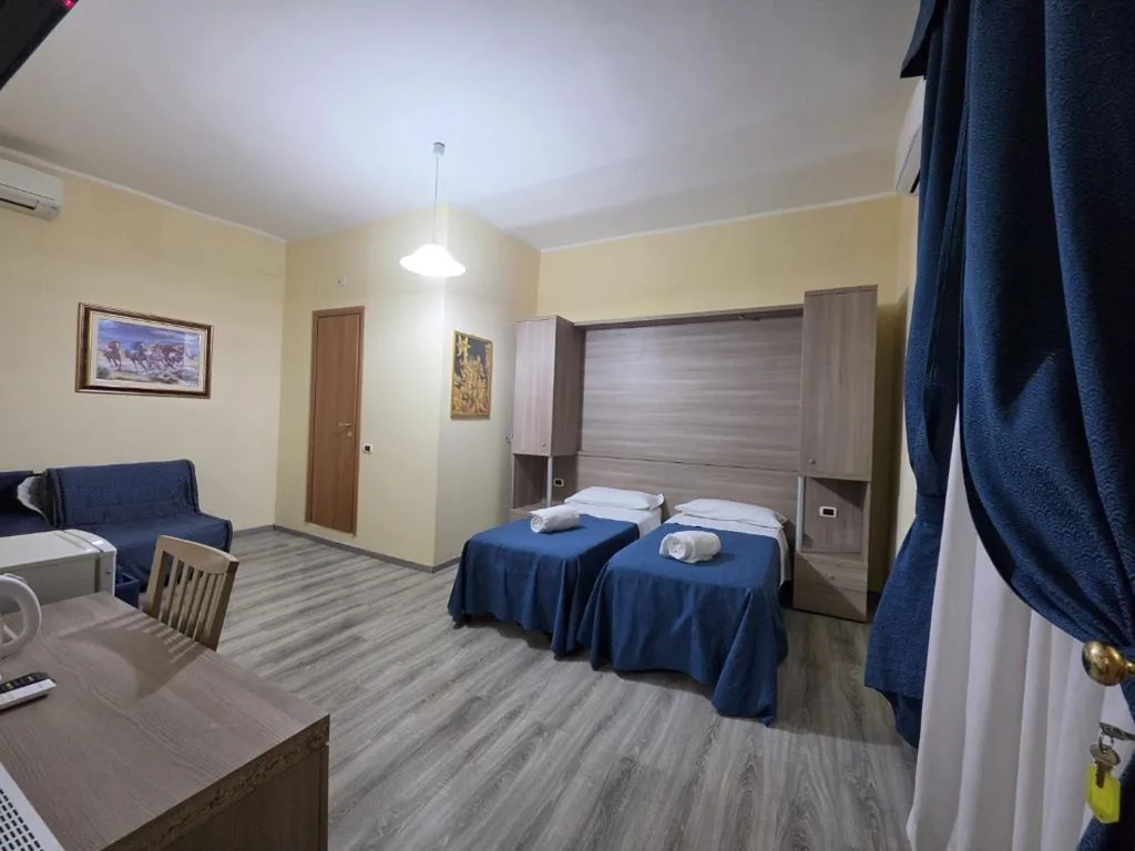 Camera Standard Matrimoniale/Doppia con Letti Singoli — HC Accomodation Corallo