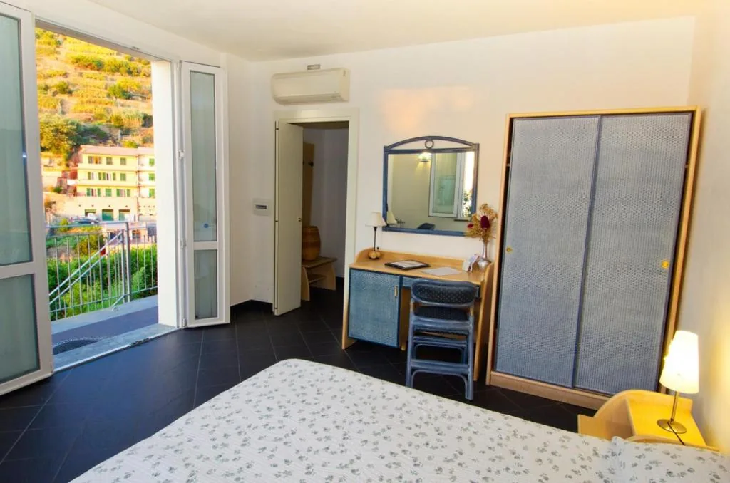 Camera Superior Matrimoniale/Doppia con Letti Singoli con Terrazza — Cinqueterre Residence