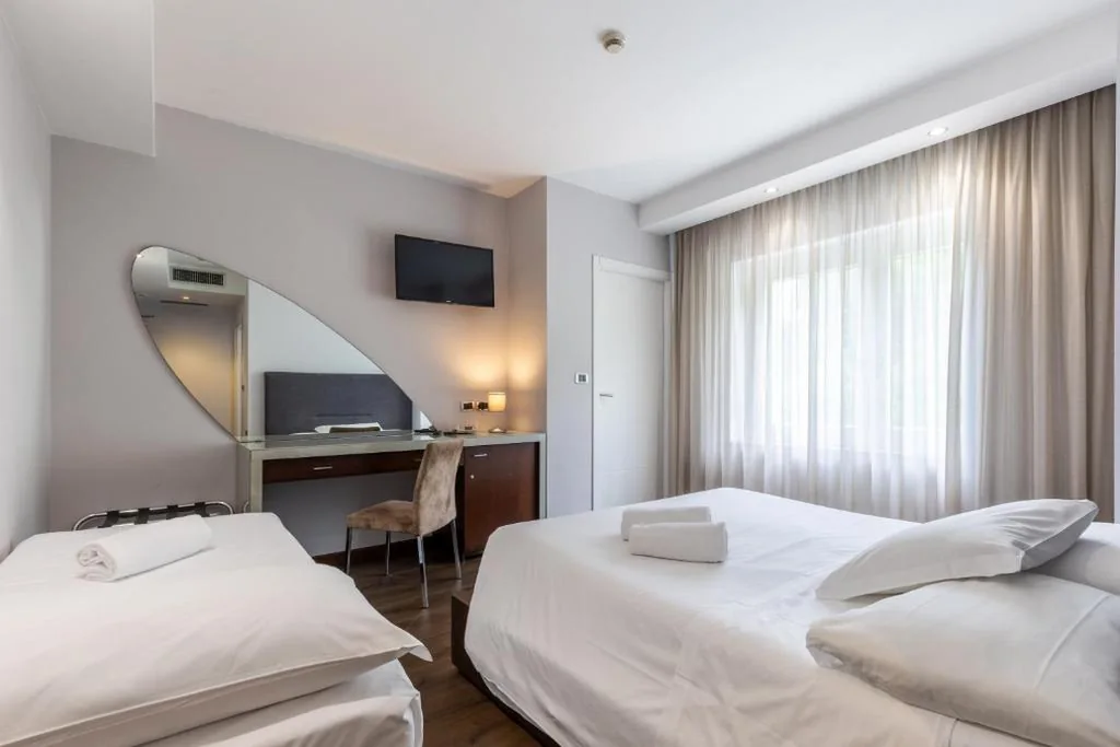 Triple Room — Aston Hotel