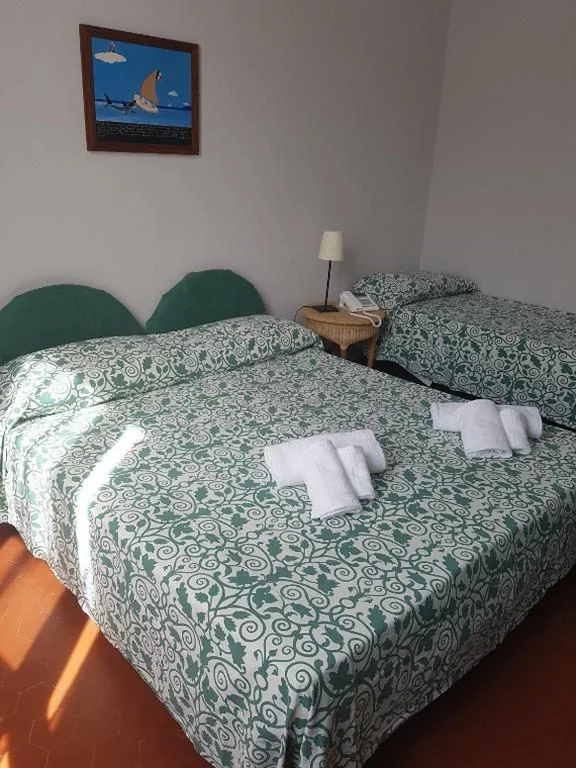 Basic Triple Room — Albergo Lungomare