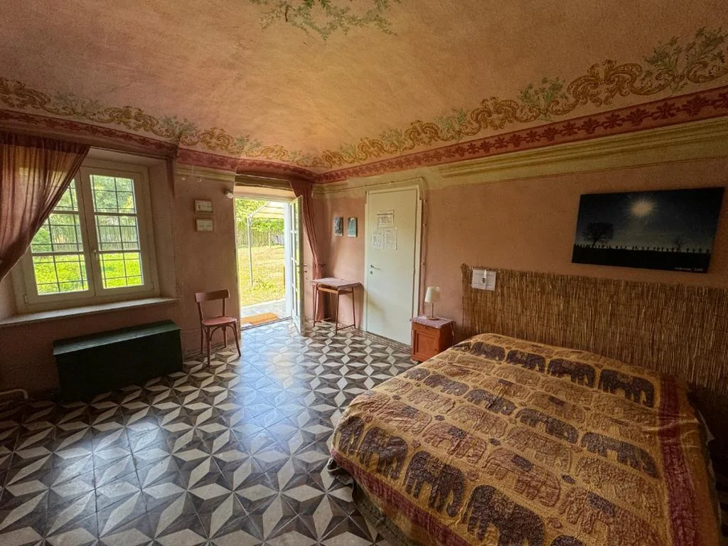 Basic Triple Room with Shared Bathroom — Casa del Movimento Lento – Guesthouse