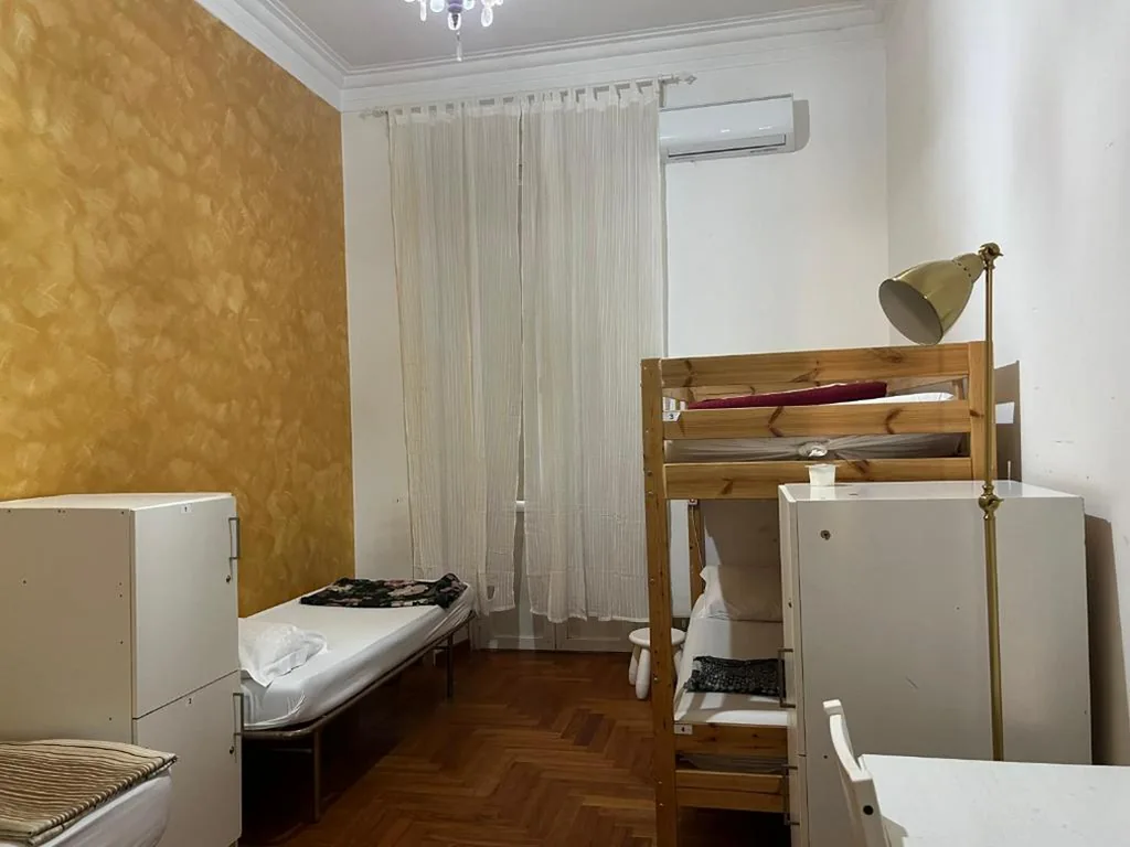 Basic Triple Room with Shared Bathroom — Varese Guest House