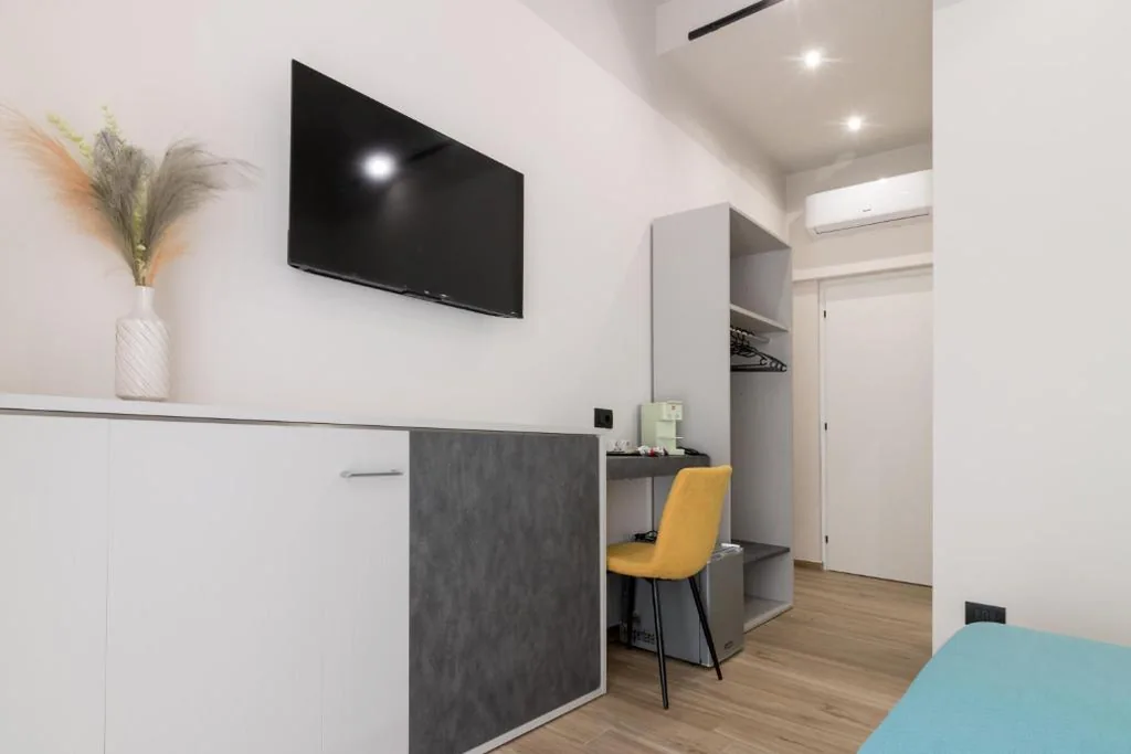 Camera Tripla Basic — Hispirya Rooms