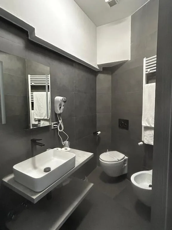 Basic Triple Room — Hotel Ferrucci