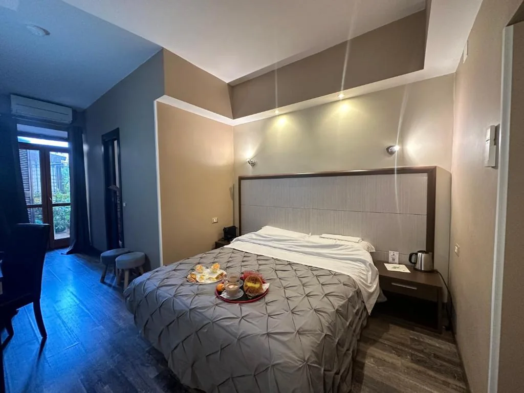 Camera Tripla — Candia Rooms