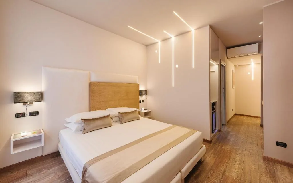 Camera Tripla Classic — Etruska luxury Trastevere Guesthouse