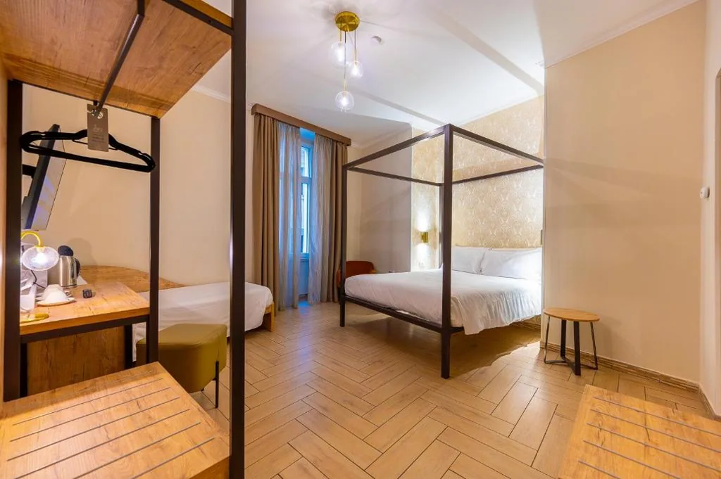 Camera Tripla Classic — Four Rivers Suites