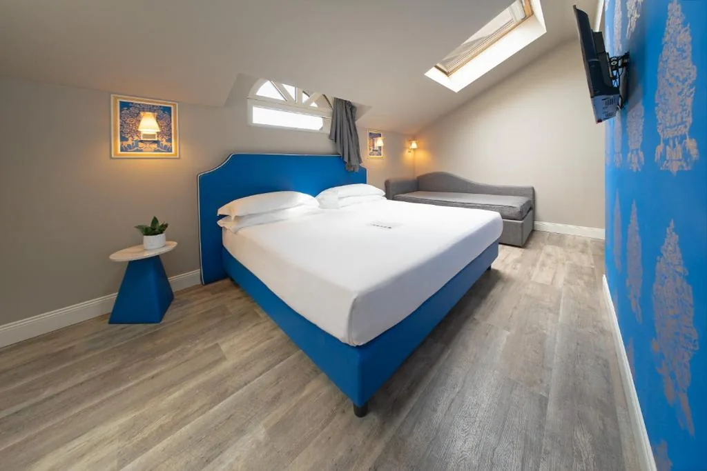 Camera Tripla Classic — Hotel Al Campanile – Luxury Suites & Apartments