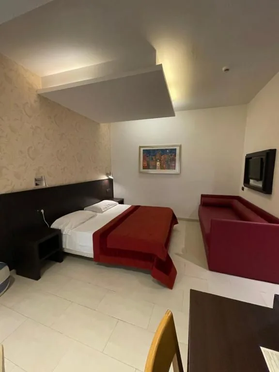 Classic Triple Room — Hotel De Petris
