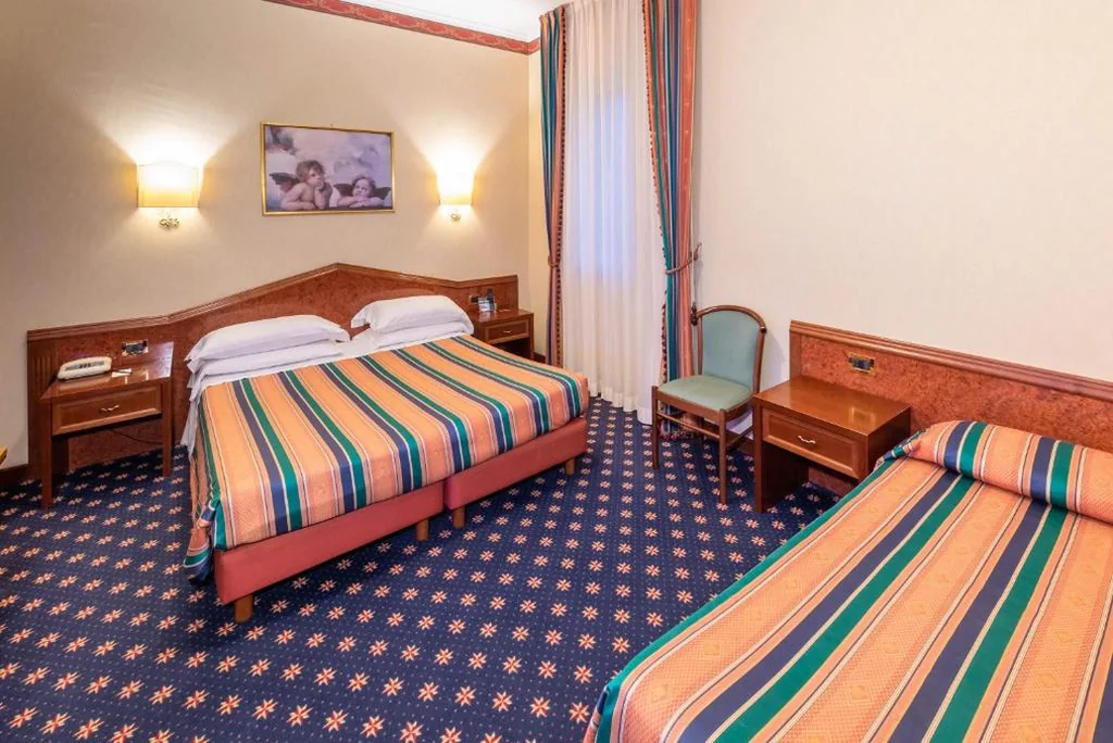 Classic Triple Room — Hotel Royal