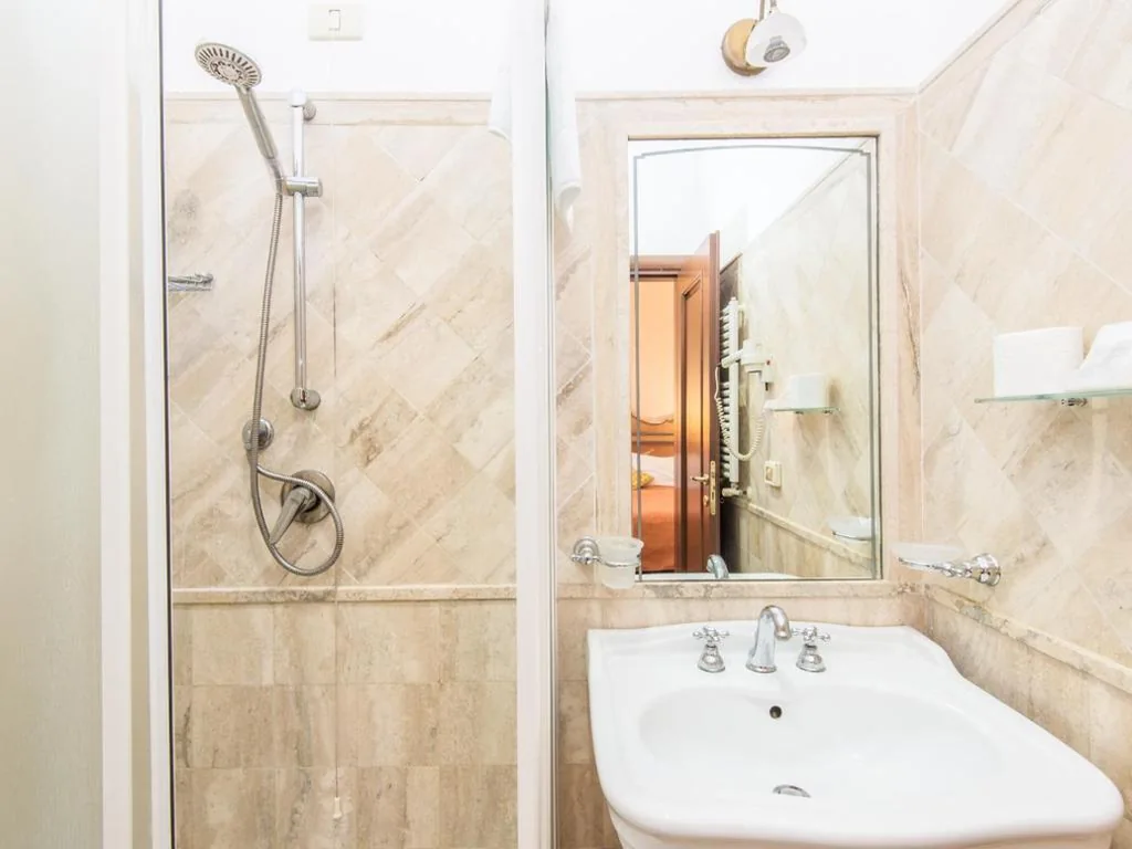 Classic Triple Room — Il Gattopardo Relais