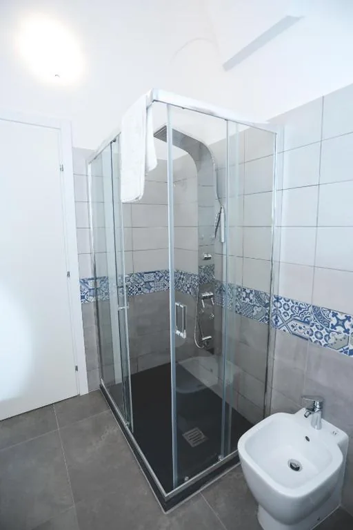 Comfort Triple Room with Shower — IL VIAGGIATORE VIA INDIPENDENZA 2