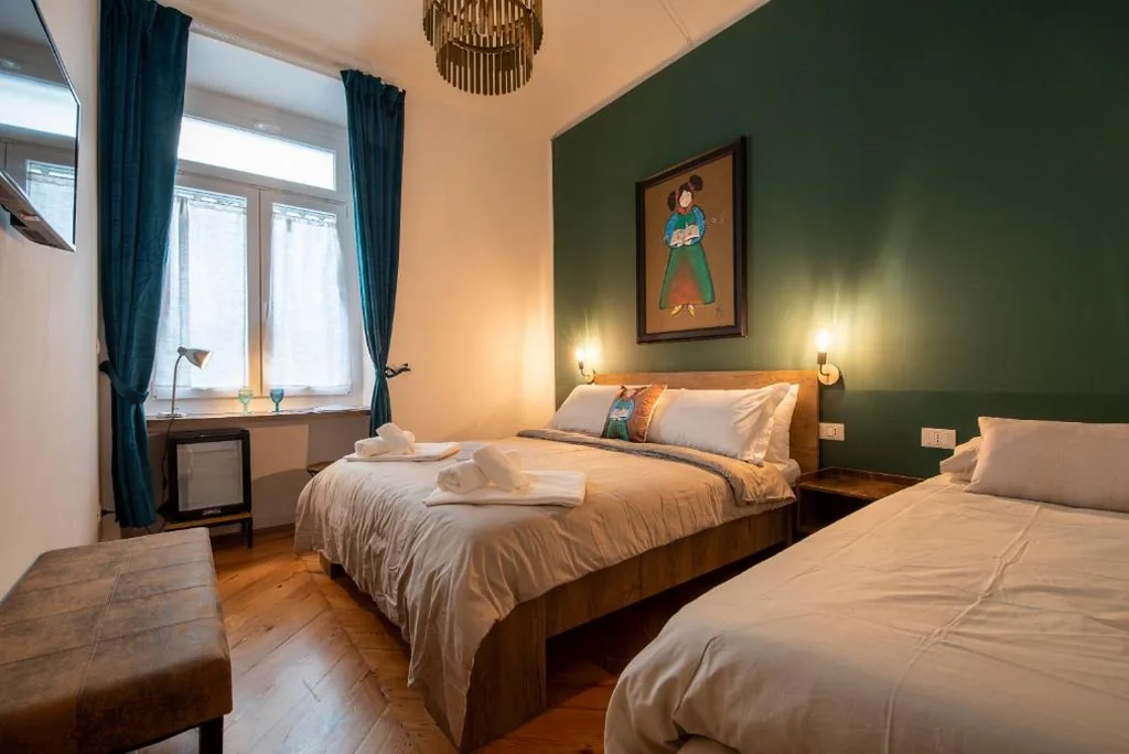 Camera Tripla Comfort — LE MADAMINE ROOMS
