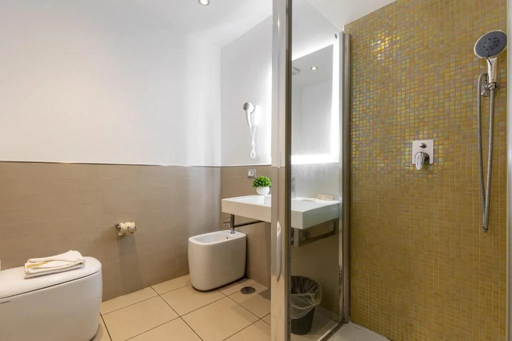 Camera Tripla Comfort — Merulana 43 – Guest House