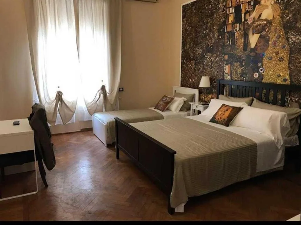 Triple Room with Shared Bathroom — Central City Genova