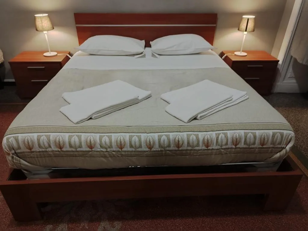 Camera Tripla con Bagno in Comune — Guesthouse La Briosa Nicole