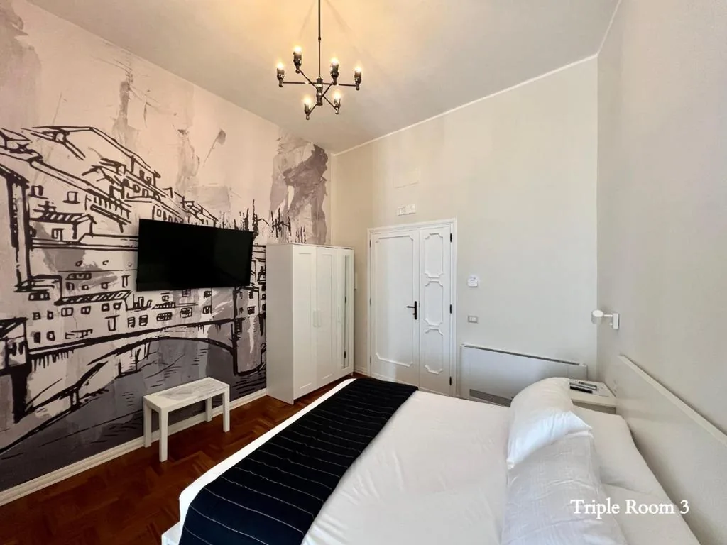 Triple Room with Private Bathroom — Be Your Home – Guest House Fuori Dal Porto